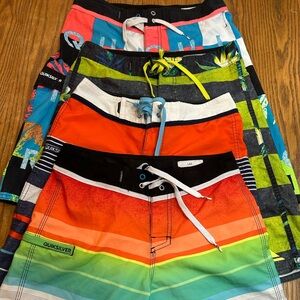 Bundle of 4 Quiksilver Board Shorts. Size 27-28.